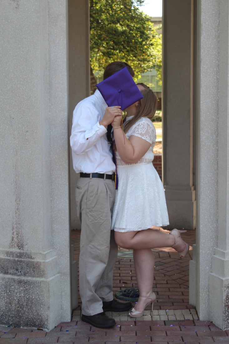 couples graduation picture